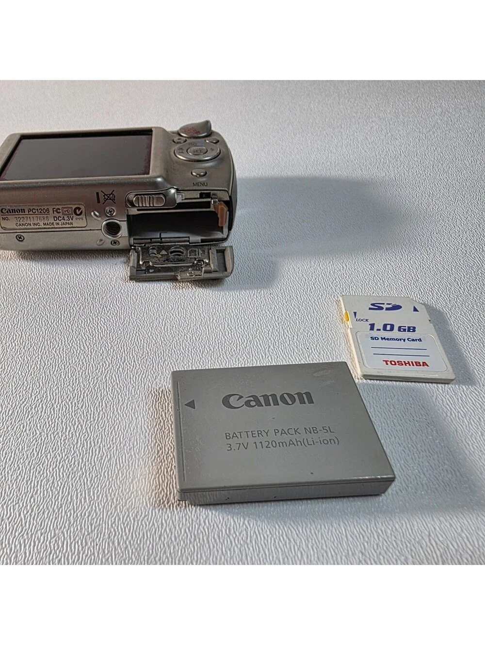 Canon PowerShot ELPH SD900 10.0MP Titanium Digital Camera Gray Tested Working